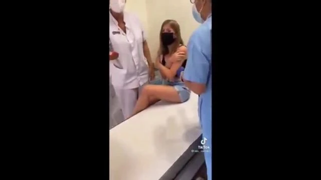 GIRL CRIES AS SHES INJECTED WITH COVID VACCINE AGAINST HER WILL! TORTURE! CHILD ABUSE!