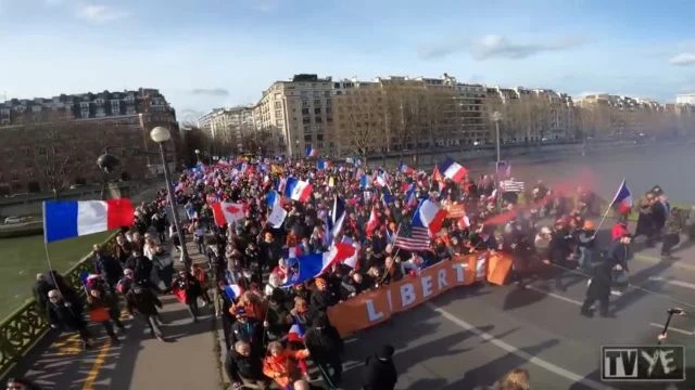 Tens of thousands took to the streets of Paris today to show their disdain for Emmanuel Macron and t