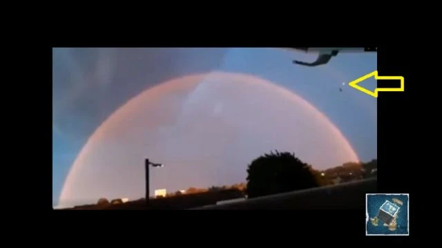 White UFOs Shooting from a Red Dome Rainbow Totally Normal