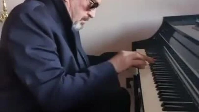 John McAfee on the piano - ONE OF THE GREATEST HUMANS TO EVER LIVE