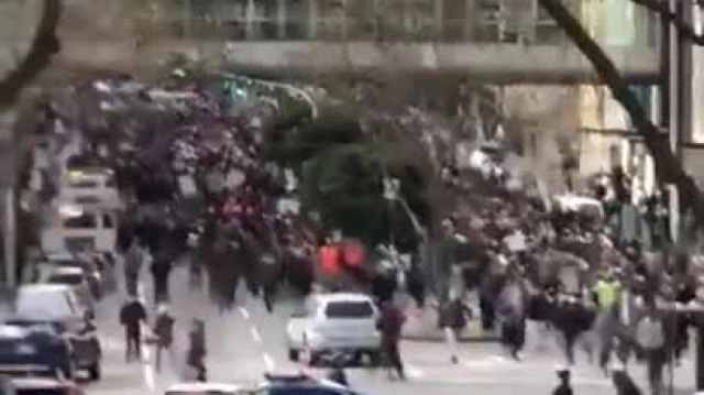 Massive Crowds Marching in Melbourne Australia