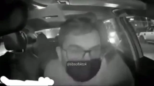 Chicago Uber drive fixes his mask while ducking gunfire