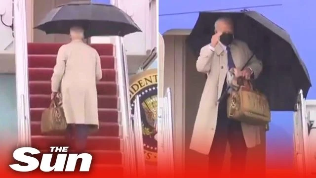 Joe Biden stumbles and almost falls over AGAIN while boarding Air Force One two weeks after slip-up