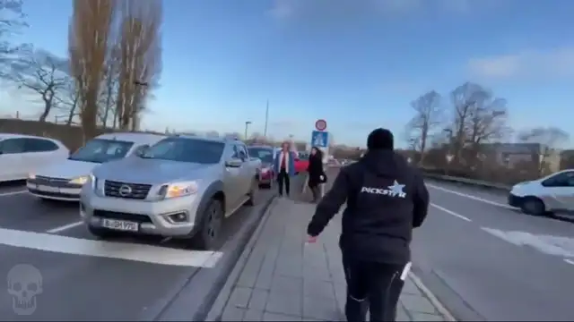 Libtard Blocking The Road Slapped To Hell By A Man Late For Work!
