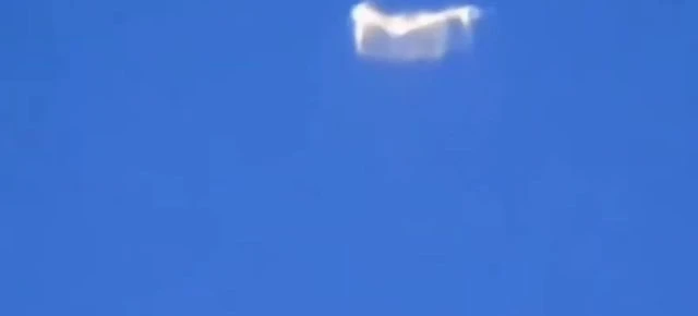 Shapeshiftng UFO Filmed By German Tourist From Plane (Allegedly)