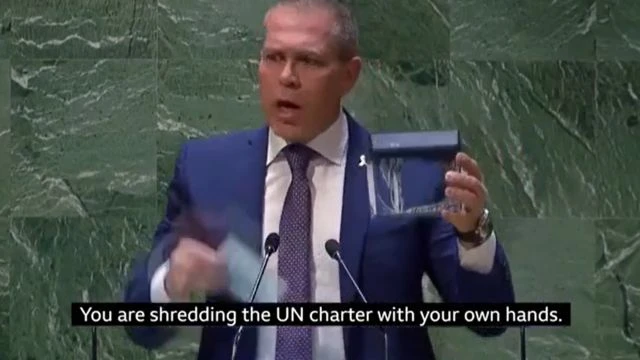 Israeli Ambassador Shreds UN Charter With Tiny Shredder