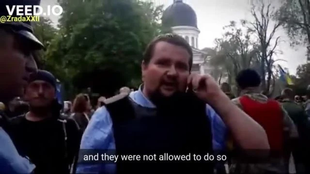 Footage from 2 May 2014 shows Ukrainian authorities openly coordinating a #massacre in the Trade Unions House